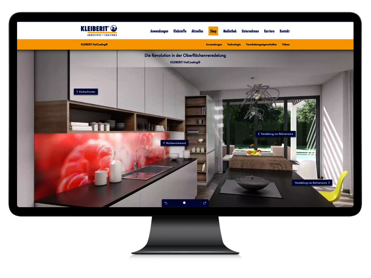 Das Bild zeigt einen Computer-Bildschirm, auf dem die Küche des Kleiberit 3D-Hauses zu sehen ist mit räumlicher Navigationsmöglichkeit und Infopunkten, die die Anwendungen erläutern.