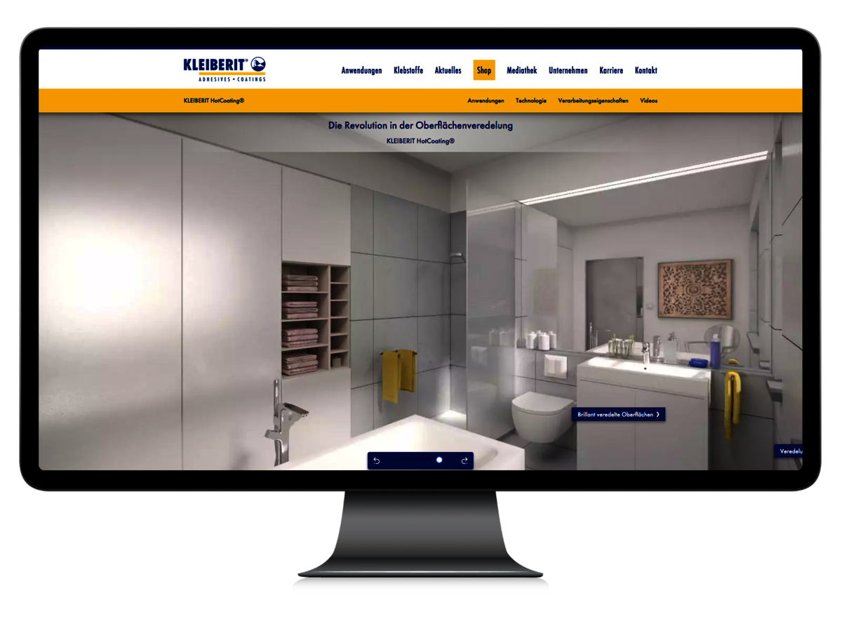 Das Bild zeigt einen Computer-Bildschirm, auf dem das Bad des Kleiberit 3D-Hauses zu sehen ist mit räumlicher Navigationsmöglichkeit und Infopunkten, die die Anwendungen erläutern.